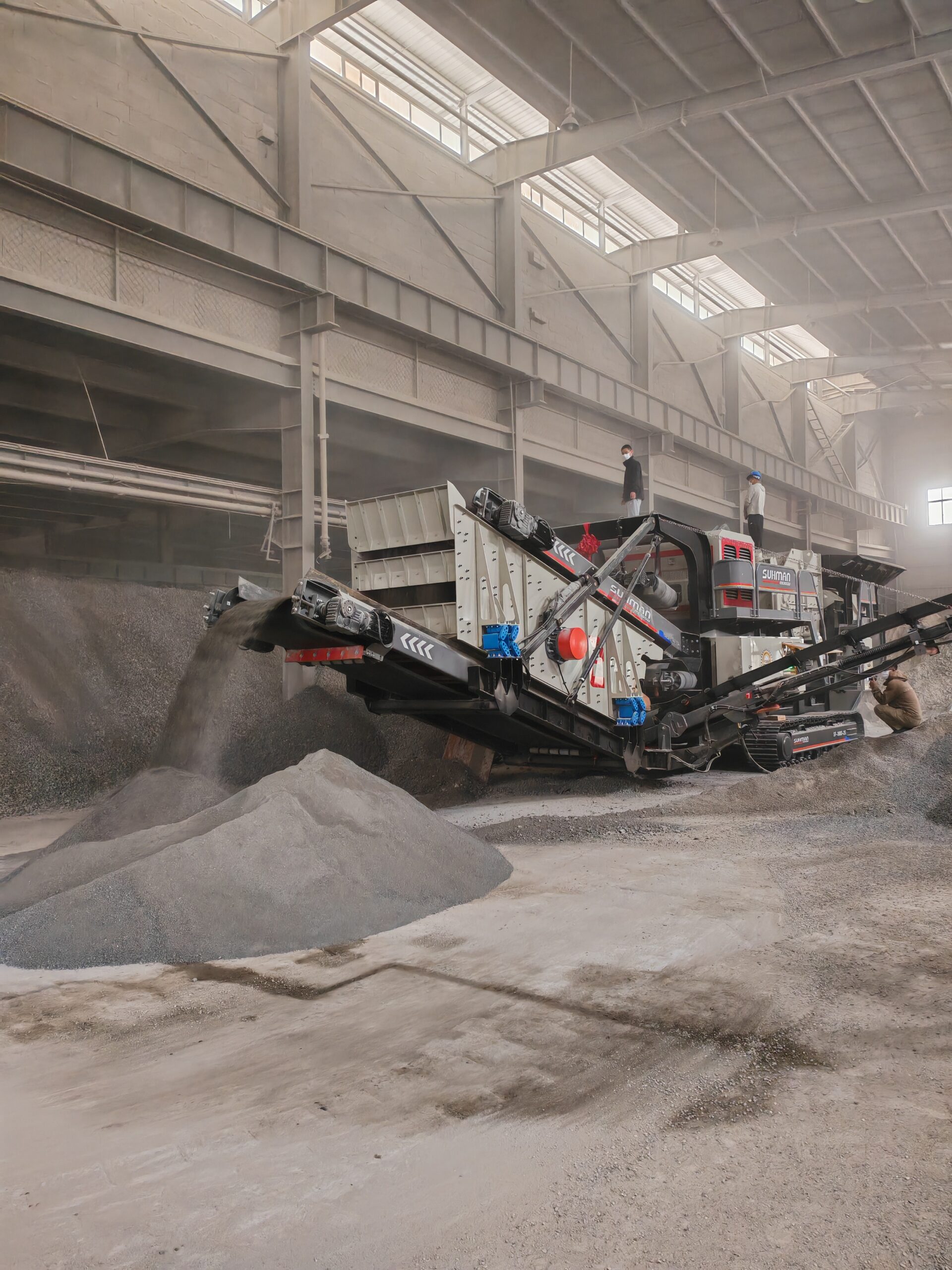 What is the purpose of the hanging screen on the crusher